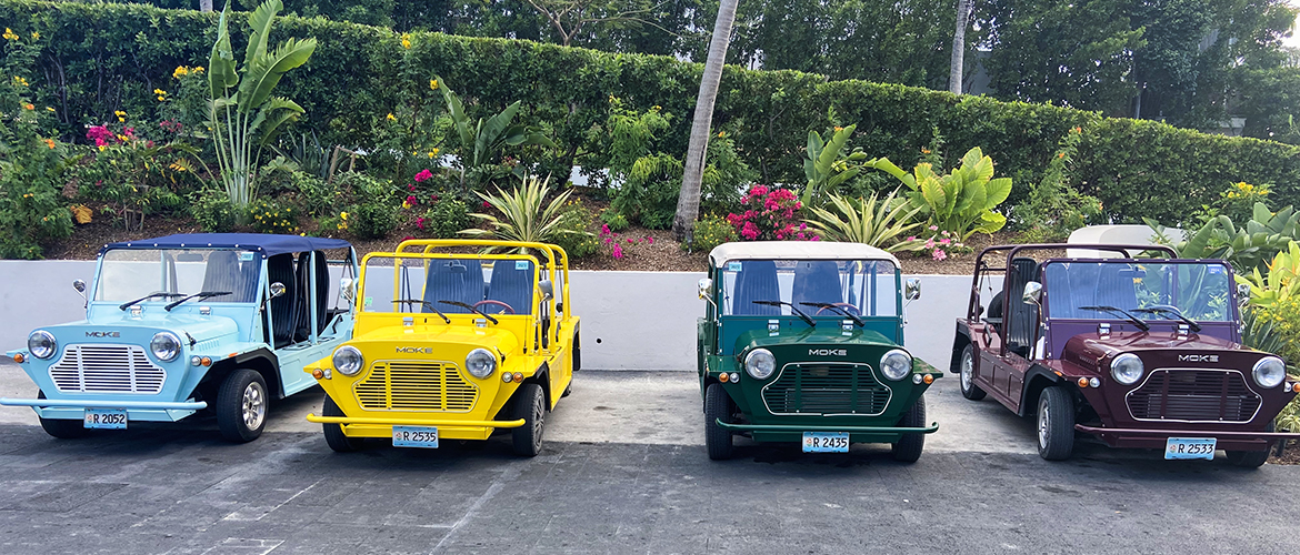 An image of small cars for rent MOCKS, in front of Four Seasons hotel