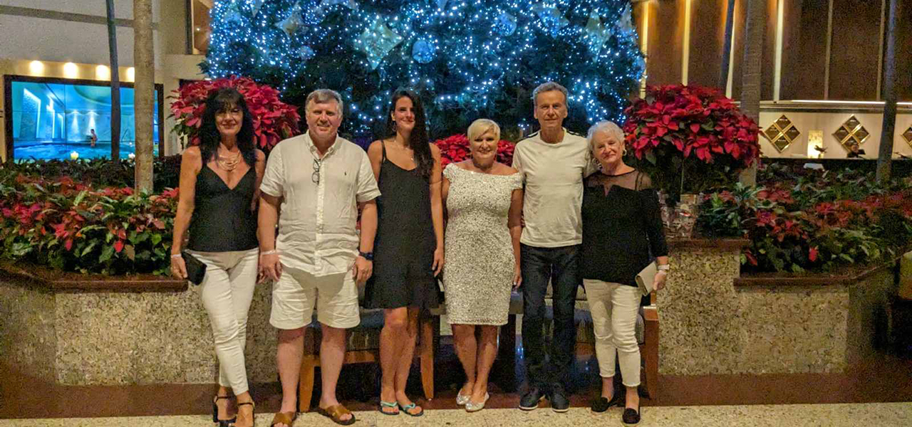 A group image under the Christmas tree