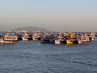 Boats ancored in front of Gateway of India