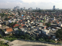 Across the side where all modern fancy buildings are standing with all of the lights on and around them, there is this area where many locals live. Although Jakarta is very modern city, there is a lot of poverty as well..