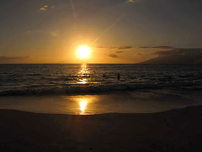 An image of sunset at Maui beach
